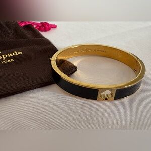 Kate Spade New York Black enamel and gold bracelet “Spade Punch Bangle”